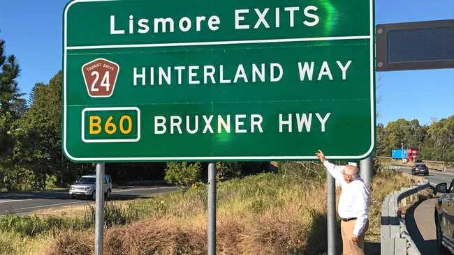 Thomas George unveils Lismore highway sign on Pacific Highway.