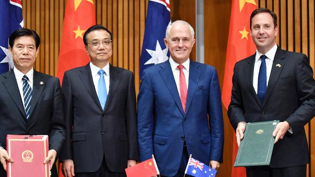 Chinese Minister of Commerce Zhong Shan (L) with Premier of the State Council of the People's Republic of China Li Keqiang, Turnbull and Australia's then Minister for Trade Steven Ciobo in 2017. Picture; AAP.