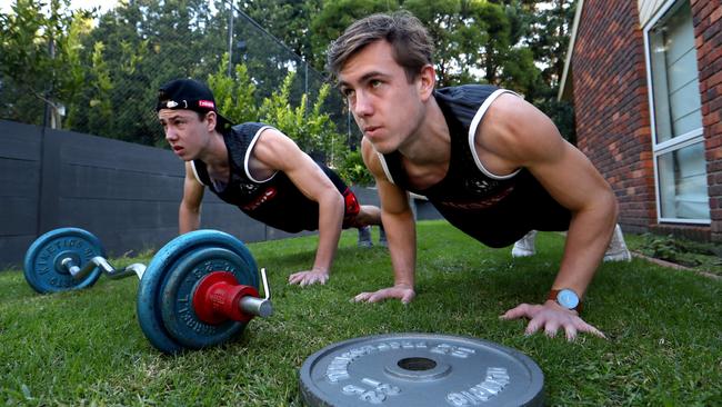 Tyler and Callum Brown train away from their teammates for perhaps the last time Picture: David Geraghty