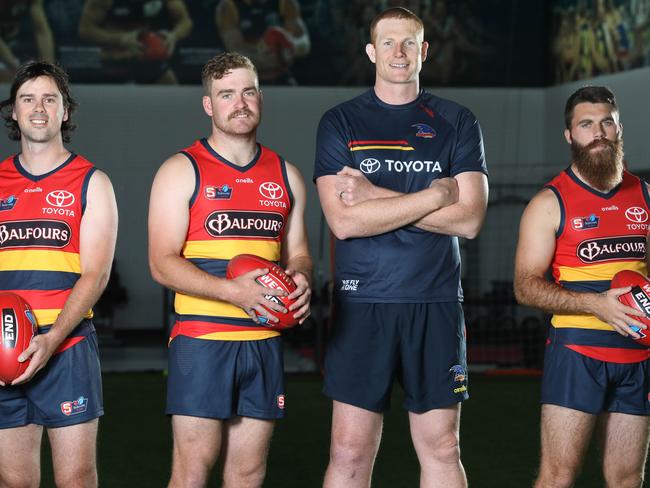 Sam Jacobs will be helping the coaches of the Crows SANFL side for this coming season, pictured here with new recruits Chris Hall, Josh Smithson and Isaya McKenzie. Picture: Dean Martin