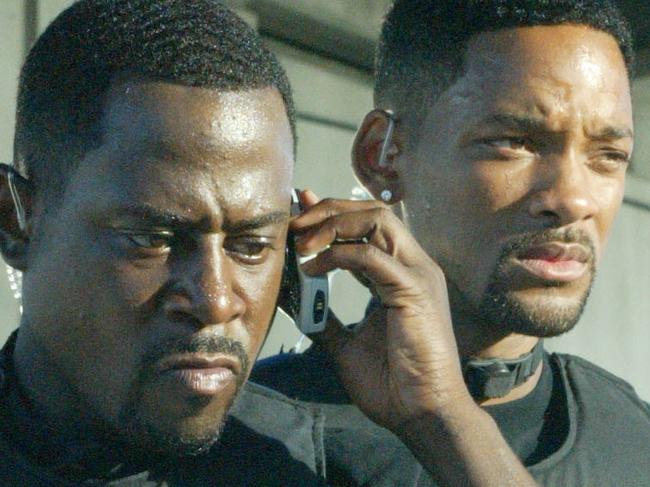 Actor Martin Lawrence (l) with Will Smith (r) in scene from film "Bad Boys 2". /Films/Titles/Bad/Boys/2