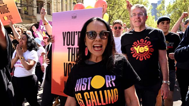 Australia's then minister for Indigenous Australians, Linda Burney, with Attorney-General Mark Dreyfus, marches in a "Walk for Yes" rally in Melbourne on September 17 last year. Picture: AFP