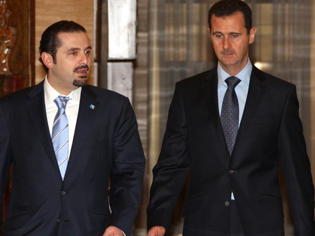 Former Lebanese Prime Minister Saad Hariri (left) with Syrian President Bashar al-Assad in Damascus in 2009. Picture: AFP