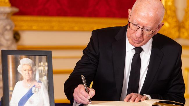 David Hurley Governor-General of Australia signs a book of condolence at Lancaster House. Picture: Getty Images