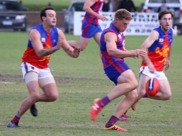 Tom Meagher gets a kick away for Upper Ferntree Gully. Picture: Tom Caruso