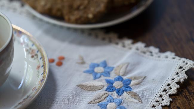 Embroidered linen placemats. Picture: Martin Ollman