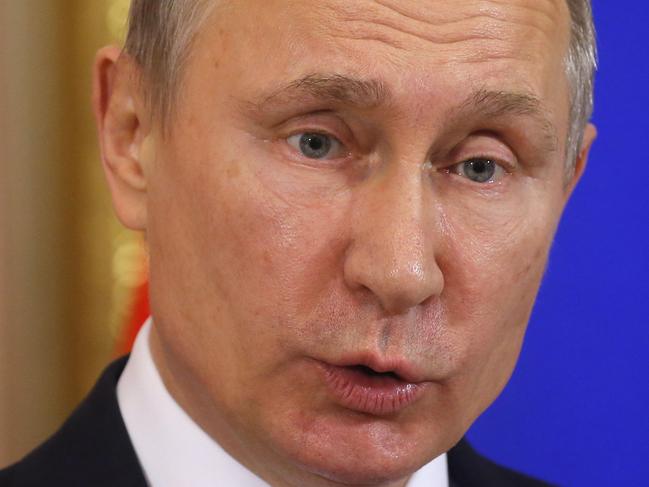 Russian President Vladimir Putin speaks during a joint press conference with his Moldovan counterpart following their meeting at the Kremlin in Moscow on January 17, 2017. / AFP PHOTO / POOL / Sergei Ilnitsky