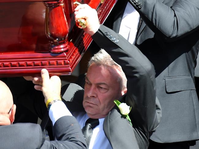 Karen's brother Stephen Williams (left) and Borce Ristevski (right) carry the coffin out of the church.  Funeral service for Karen Ristevski at St Johns Uniting church, Essendon.  Karen Ristevski's body was discovered in bushland at Mount Macedon, she was last seen at her Avondale Heights home June 29 2016. Police continue to investigate to solve the murder. Picture: Nicole Garmston