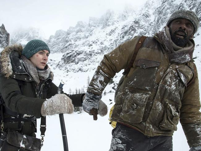 The terrain is cold but the chemistry is hot as Kate Winslet, left, and Idris Elba battle through icy terrain in The Mountain Between Us.