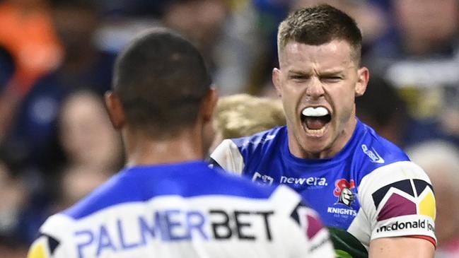 TOWNSVILLE, AUSTRALIA - SEPTEMBER 14:  Jayden Brailey of the Knights celebrates with team mates after scoring a try during the NRL Qualifying Final match between North Queensland Cowboys and Newcastle Knights at Queensland Country Bank Stadium on September 14, 2024 in Townsville, Australia. (Photo by Ian Hitchcock/Getty Images)