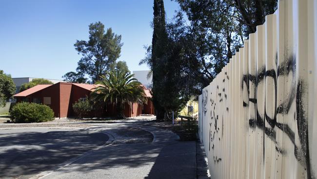 Chestnut Avenue, where all dwellings are now vacated and graffiti is scrawled on fences. Picture: Dean Martin