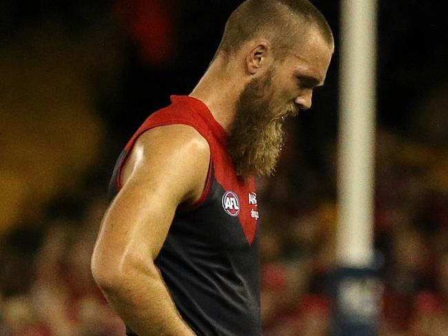 AFL Geelong Cats vs. Melbourne (ES) Max Gawn tackles Joel Selwood in the second term then then went off  with a knee injury (T) Picture:Wayne Ludbey