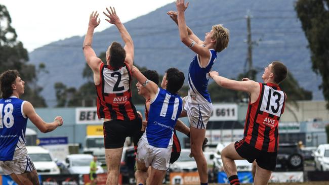 Evans (2) flies in for a grab in last year’s under-19 Premier Division grand final. Picture: Davis Harrigan