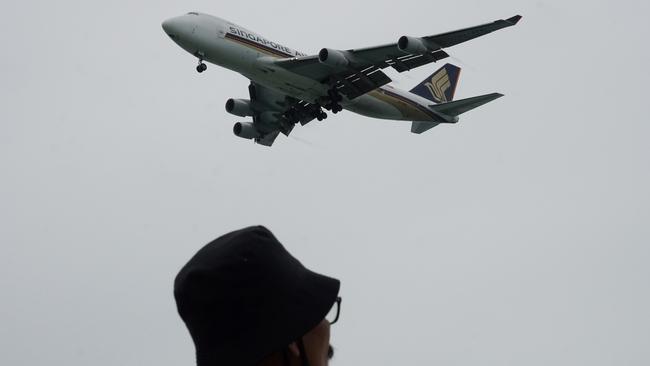 A Singapore Airlines plane on its landing approach to Changi International Airport in Singapore on Sunday. Picture: AFP