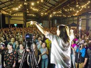 Astrid Jorgensen conducts the Pub Choir at the Blank Space, Toowoomba. More than five hundred have booked for Rockhampton's turn tonight. Picture: Nev Madsen