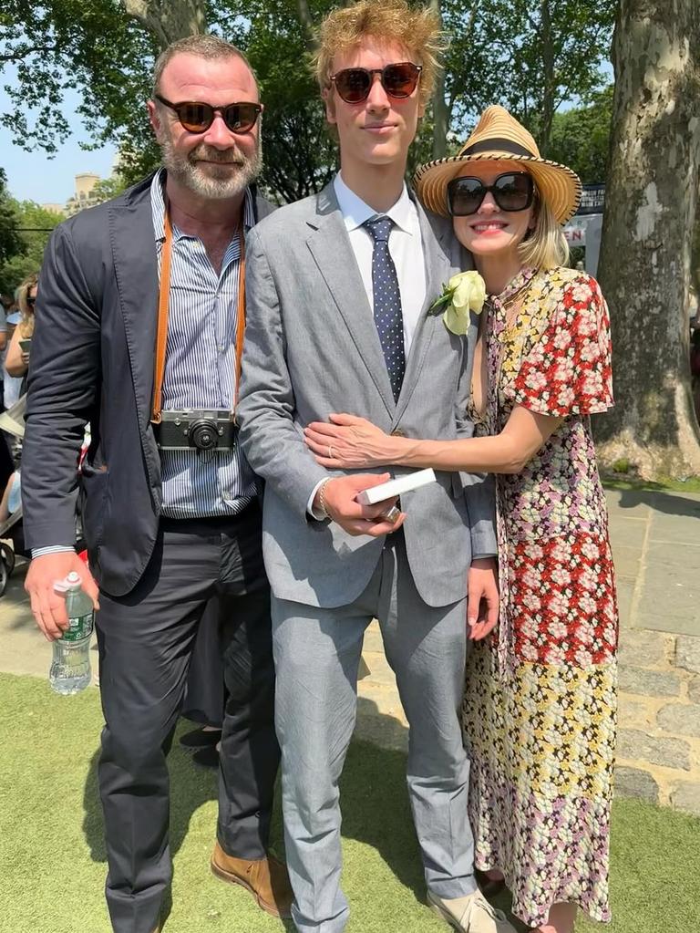 Sasha with his proud parents.