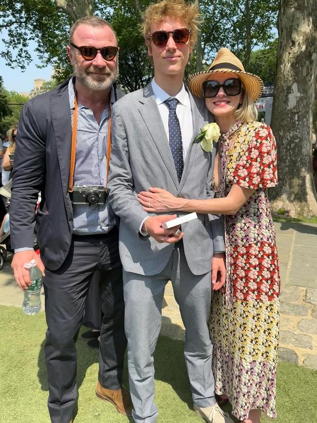 Sasha with his proud parents.