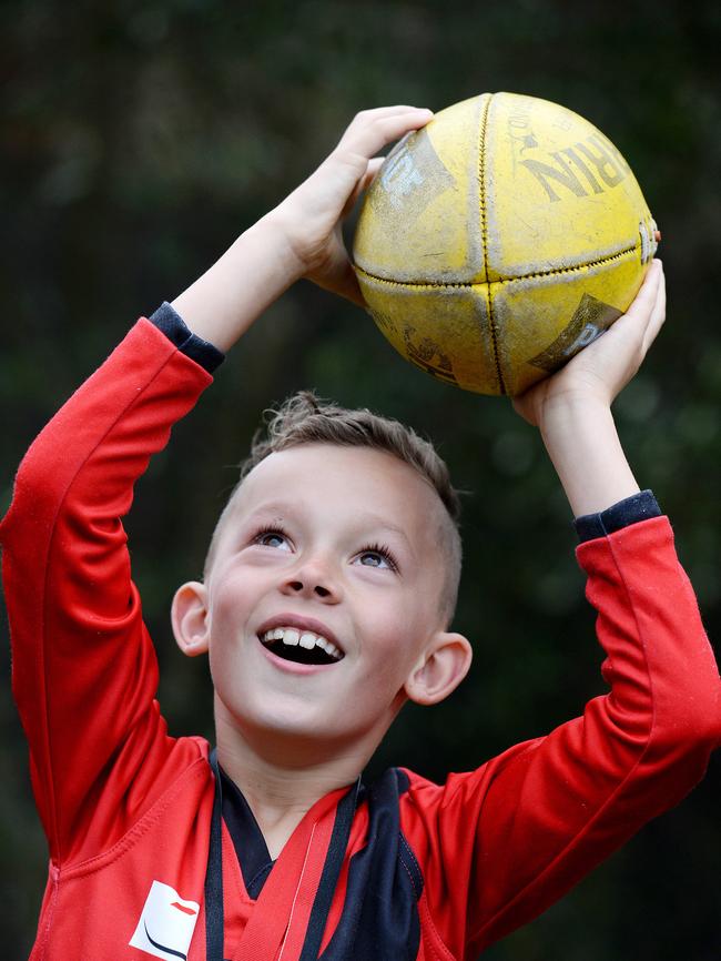 Mitchell is obsessed with AFL. Picture: Steve Tanner