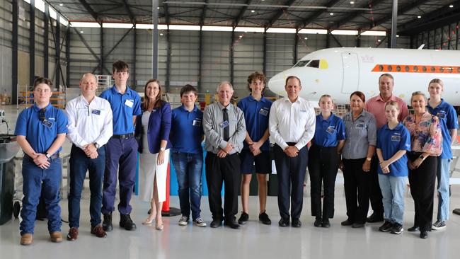 Rockhampton region mayor and councillors with students at the Alliance Airlines maintenance facility opening.