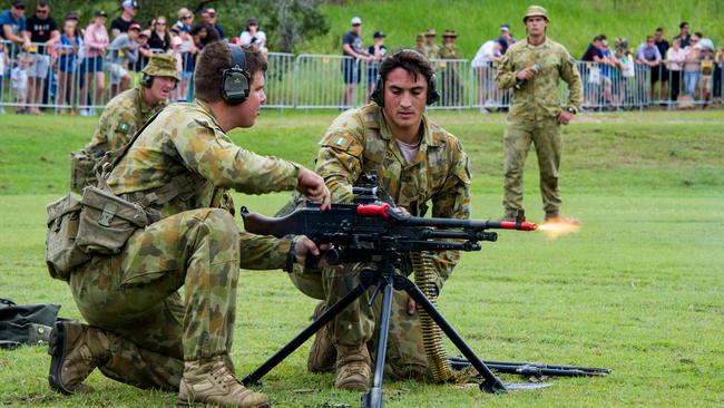 A heavy weapons crew from 6th Battalion, Royal Australian Regiment demonstrates the firepower of the MAG 58 machine gun during a previous 7th Brigade Open Day. Picture: Department of Defence