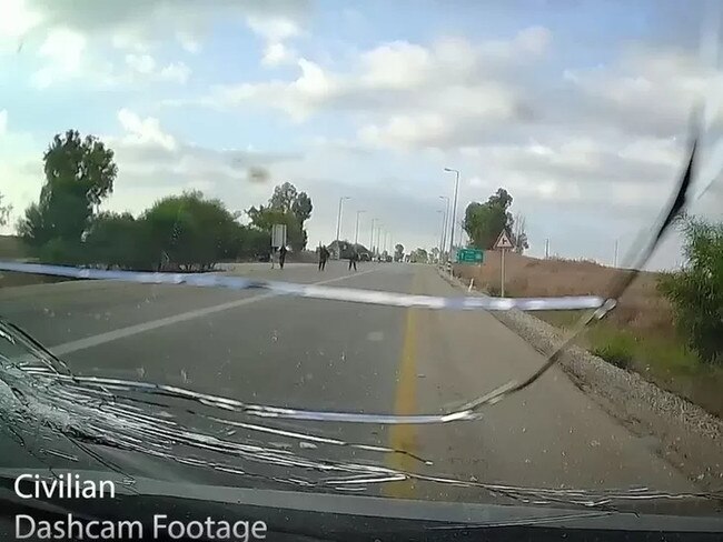 Dashcam footage shows Hamas gunmen firing at a civilian car, cracking the windscreen. Picture: IDF