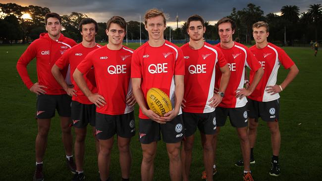 Mills (front) says the Swans academy was a big reason he chose AFL over other codes. Pic: Phil Hillyard