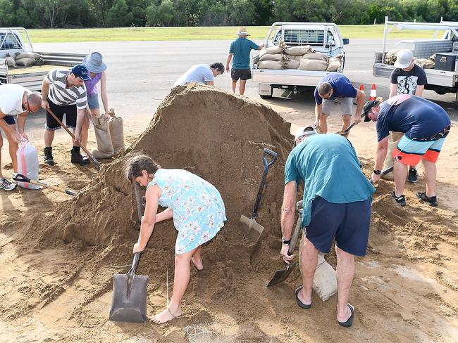 Townsville residents fill sandbags in preparation for Cyclone Debbie. Picture: Ian Hitchcock/Getty Images