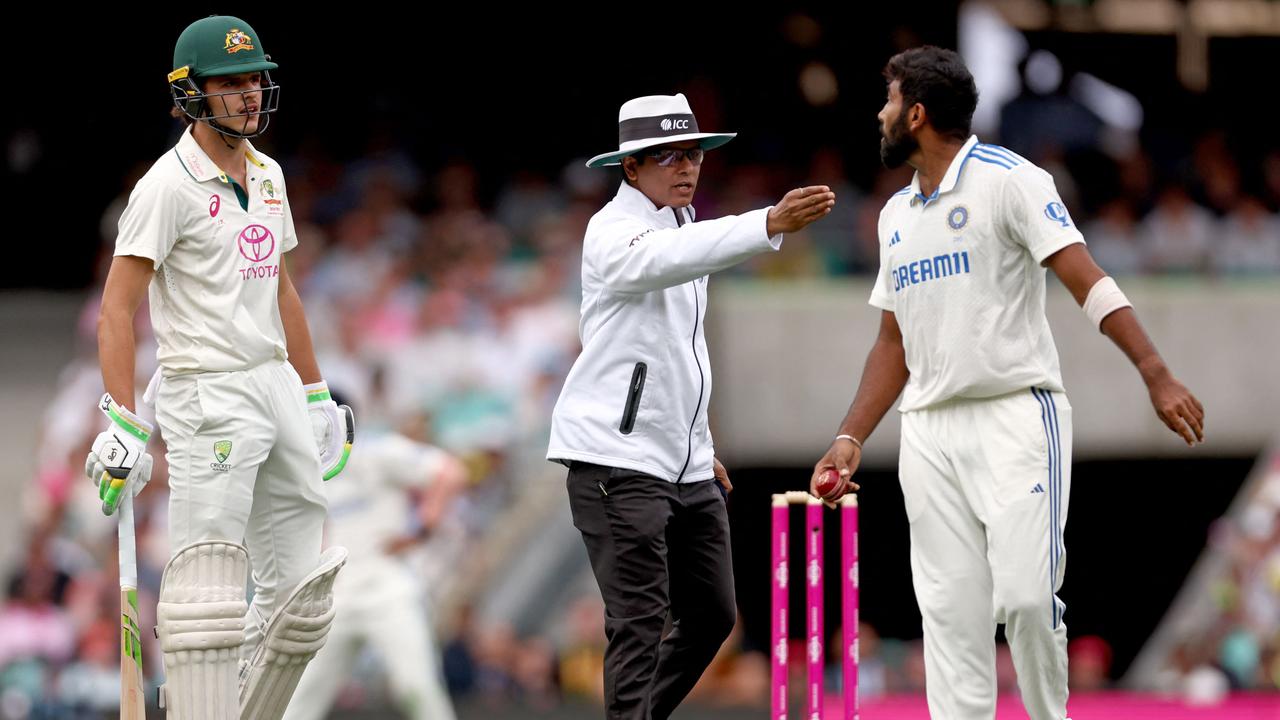 Sam Konstas interacts with Jasprit Bumrah in the last over of Day 1. (Photo by DAVID GRAY / AFP)