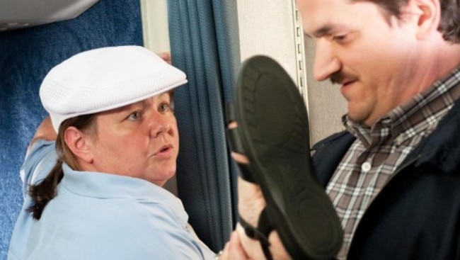 Melissa McCarthy and husband Ben Falcone in a scene from ‘Bridesmaids’.