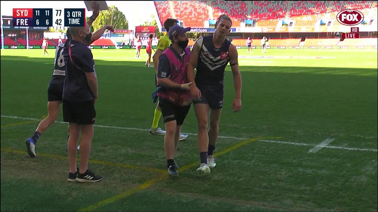 Fyfe walks off with a shoulder injury. Picture: Fox Footy