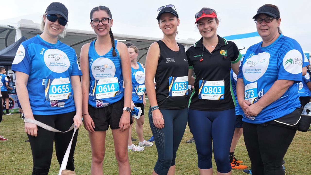 Marlo the dog is set to go with, from left, Leishan Pace, Lara McKenzie, Tract Hess, Francesca Wolsey, Heidi Bloye.