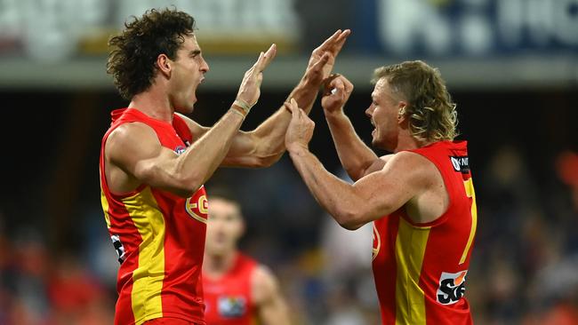 Ben King, left, recorded just nine tackles in 20 games last season. Picture: Albert Perez/AFL Photos