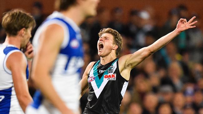 Xavier Duursma celebrates after kicking a goal against North Melbourne. Picture: Daniel Kalisz/Getty Images