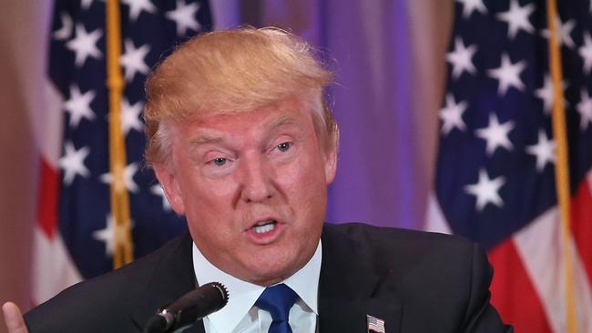 PALM BEACH, FL - MARCH 01: Republican Presidential frontrunner Donald Trump speaks to the media at his Mar-A-Lago Club on Super Tuesday, March 1, 2016 in Palm Beach, Florida. Trump held a press conference, flanked by New Jersey Governor Chris Christie, after the polls closed in a dozen states nationwide. John Moore/Getty Images/AFP == FOR NEWSPAPERS, INTERNET, TELCOS & TELEVISION USE ONLY ==