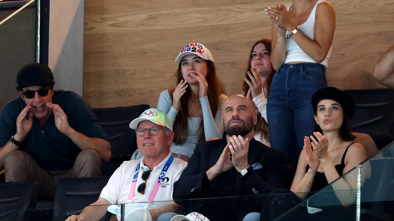 Sacha Baron Cohen gets animated alongside John Travolta. Picture: Getty Images