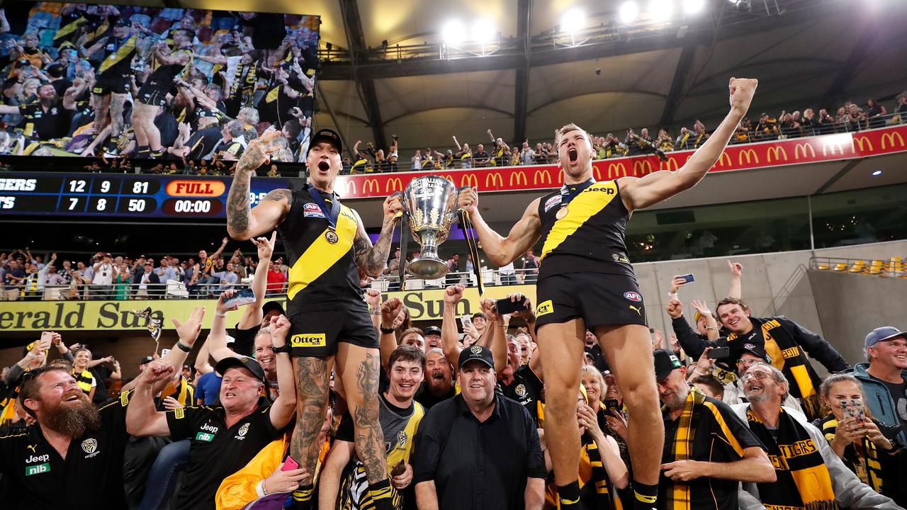 Dustin Martin and Noah Balta celebrate with Richmond fans at last year’s grand final at the Gabba. Picture: Michael Willson/AFL Photos