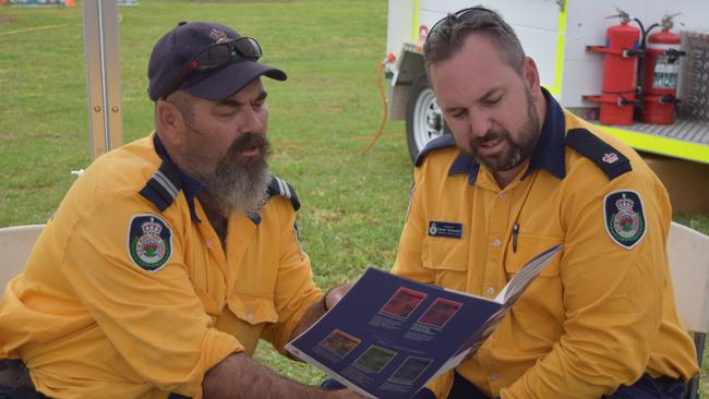 Rural Fire Service regional director Daniel Ainsworth (right) speaks to Mick Stain at an event in Lismore. Photo: Jackie Munro