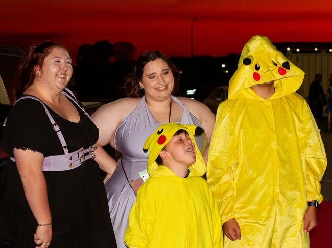 Trinity Brazier and Aaliyah Hadring escorted by some pokemon.