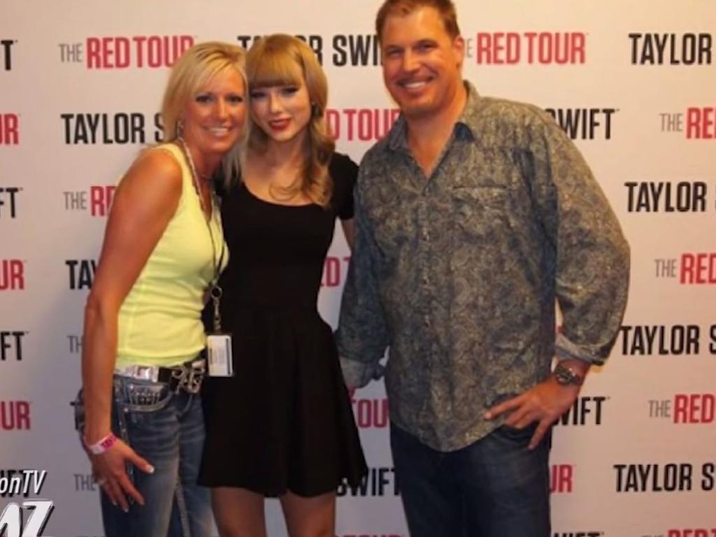 Taylor Swift poses with DJ David Mueller in the photo where he is allegedly groping the singer. Picture: TMZ
