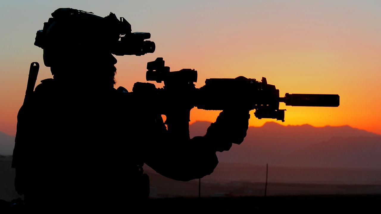 An Australian Army soldier from Special Operations Task Group prepares for a night mission in Uruzgan province, Afghanistan, in 2010. Picture: Department of Defence