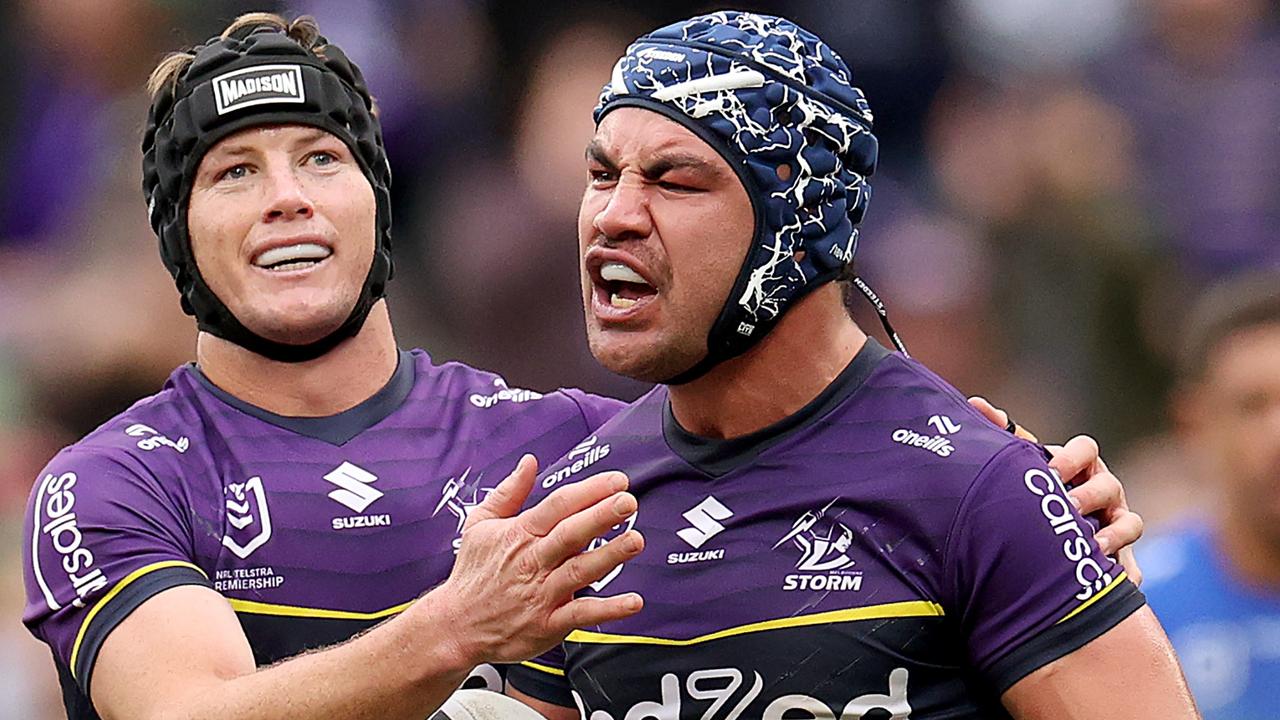 MELBOURNE, AUSTRALIA - JUNE 09: Jahrome Hughes of the Storm celebrates scoring a try with Harry Grant of the Storm during the round 14 NRL match between Melbourne Storm and Newcastle Knights at AAMI Park, on June 09, 2024, in Melbourne, Australia. (Photo by Kelly Defina/Getty Images)