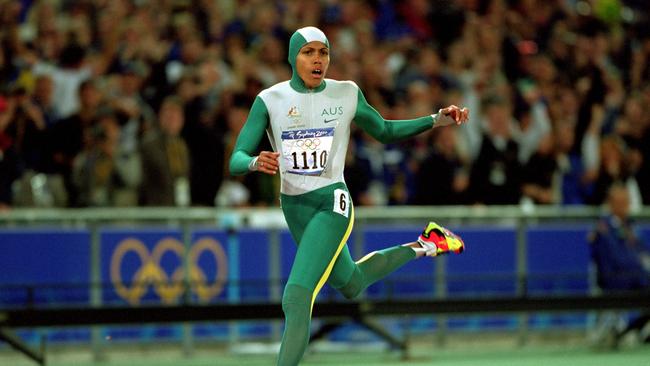 Cathy Freeman crosses the line to win gold in the women’s 400m Final. Credit: Mike Powell /Allsport