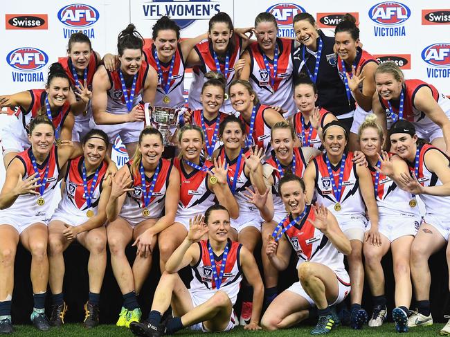 MELBOURNE, AUSTRALIA - SEPTEMBER 24:  Darebin celebrate winning the VFL Women's Grand Final match between Diamond Creek and Darebin at Etihad Stadium on September 24, 2017 in Melbourne, Australia.  (Photo by Quinn Rooney/Getty Images)