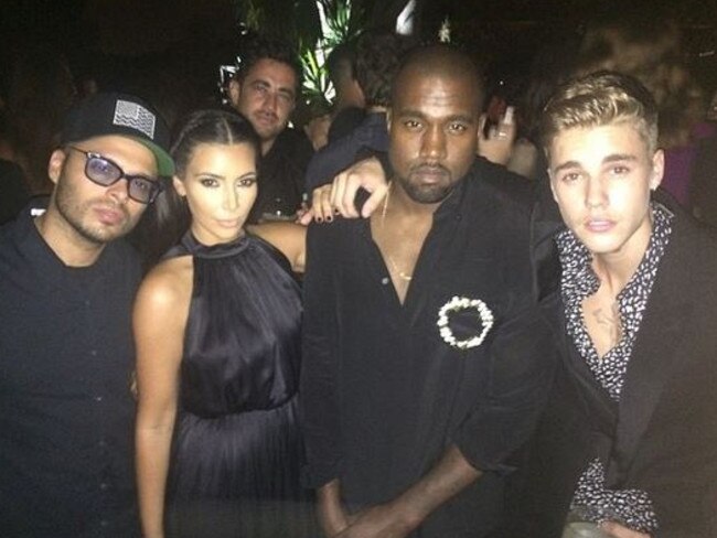 New songs ... West with Kardashian and Justin Bieber in Ibiza earlier this month. Picture: Instagram