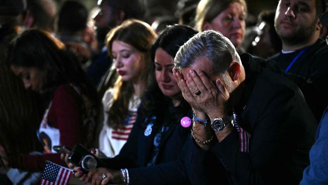 Supporters react to election results during an election night event for US Vice President and Democratic presidential candidate Kamala Harris.