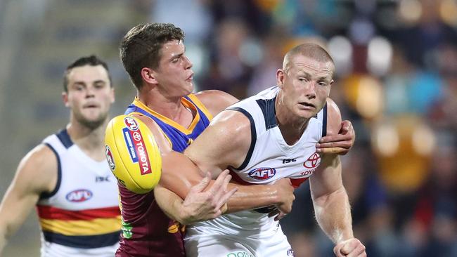 Adelaide’s Sam Jacobs is tackled during their round nine clash against Brisbane at the Gabba.