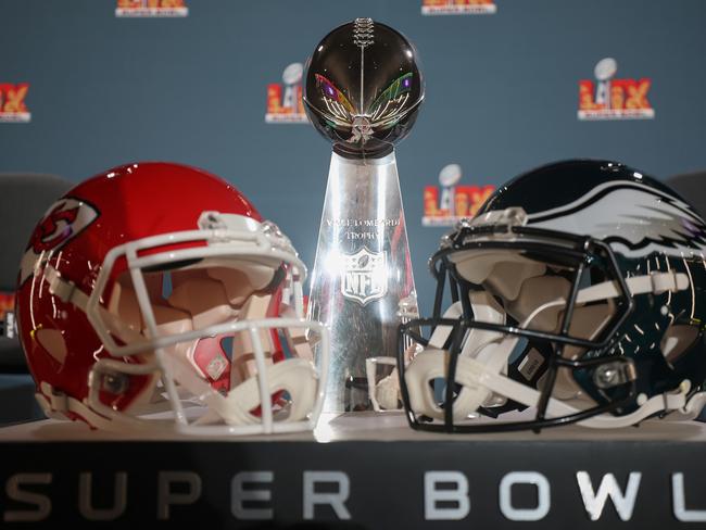 NEW ORLEANS, LOUISIANA - FEBRUARY 03: A Kansas City Chiefs helmet, the Vince Lombardi Trophy and a Philadelphia Eagles helmet are seen before the NFL Commissioner Roger Goodell's Super Bowl Press Conference ahead of Super Bowl LIX at Caesars Superdome on February 03, 2025 in New Orleans, Louisiana. (Photo by Chris Graythen/Getty Images)