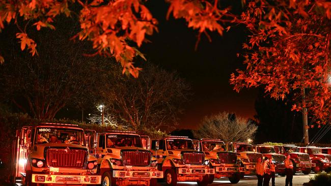 LAFD emergency vehicles line up along Mulholland drive as the Palisades Fire burns towards the Encino neighbourhood in Los Angeles, California. Picture: AFP