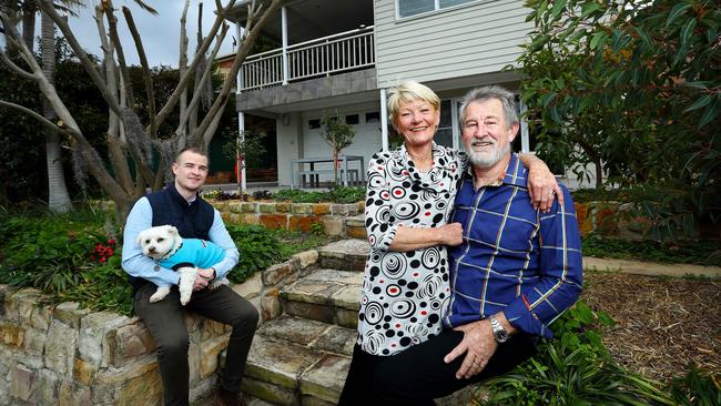 Jake (with Max), Jill and Jeff Williams are selling up in Ryde, where prices have fallen 9.4 per cent in the past 12 months. Picture: Hollie Adams