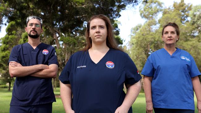 Nick Howson, NSWNMA Cumberland branch delegate president and mental health registered nurse, Julie Butterworth, NSWNMA Westmead branch and ICU nurse and Cassandra Barford, NSWNMA Bankstown branch delegate and registered nurse are getting ready to strike. Picture: Damian Shaw